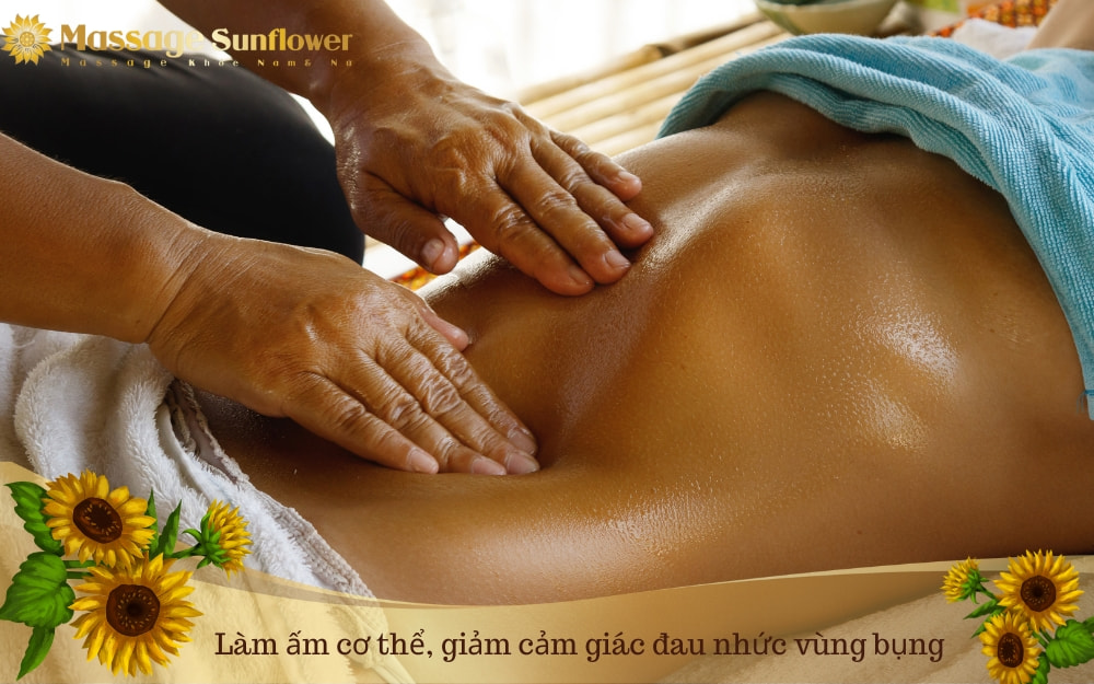 massage làm ấm bụng giảm đau bụng