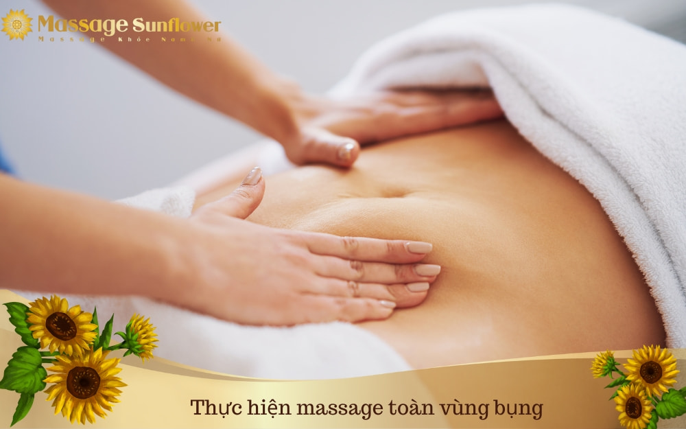 Thực hiện massage toàn vùng bụng